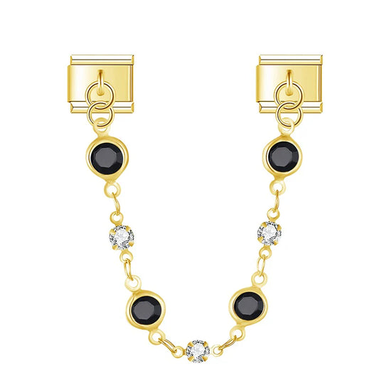 Kuldne kett mustade kividega